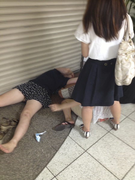 Drunk japanese woman public street